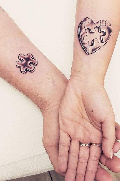 couple tattoos matching puzzles
